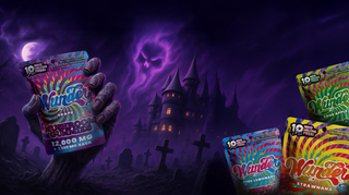 Wunder Grape, Pink Lemonade, Sour Apple and Strawnana mushroom gummies packs in a Halloween scene